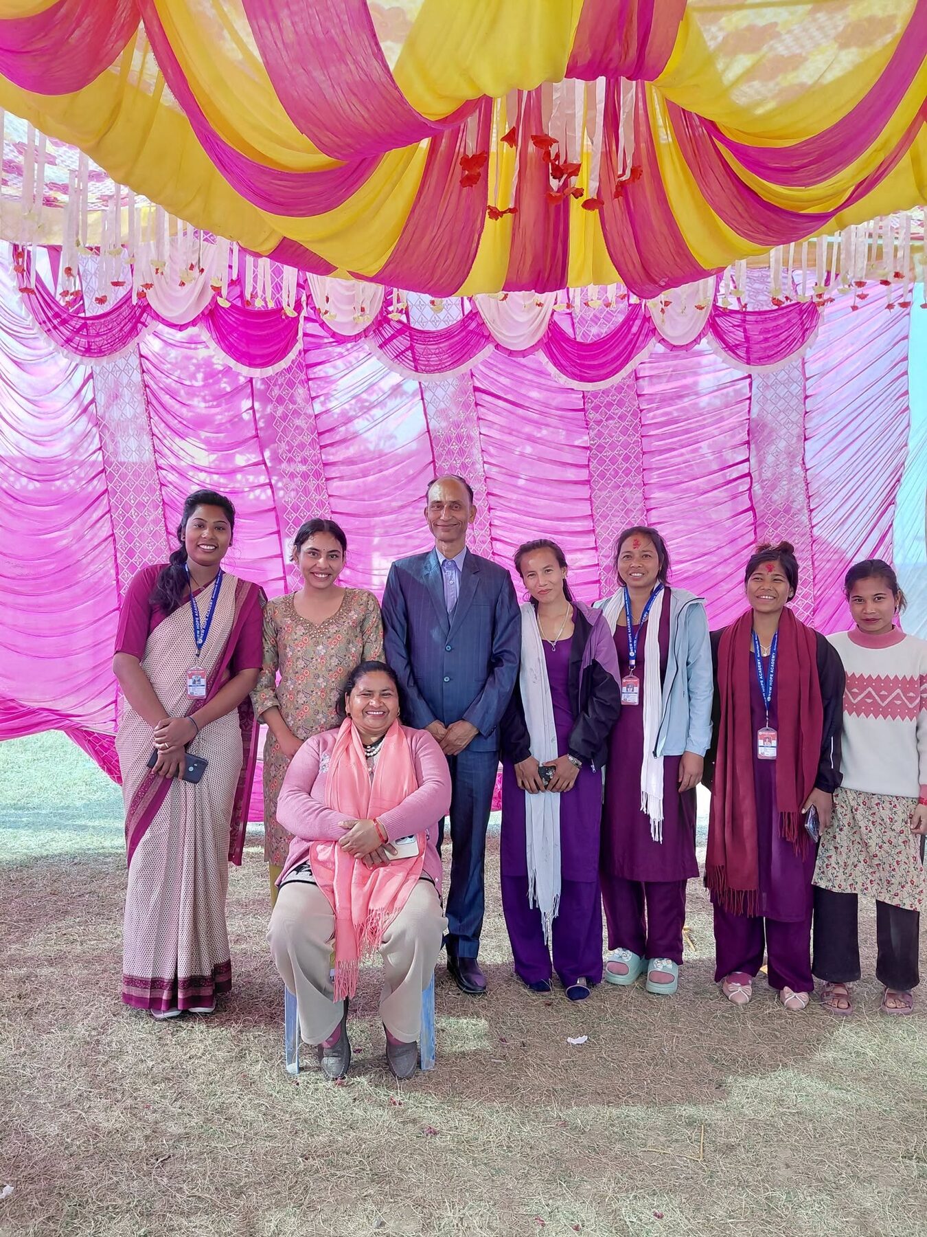 Teachers and guests standing together at the annual day celebration